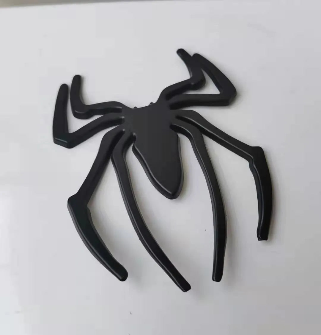 3D metallic spider bumper sticker in zinc alloy, shown in gold colour.