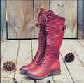 Women's black cross strap knight boots in artificial PU material with ankle straps
