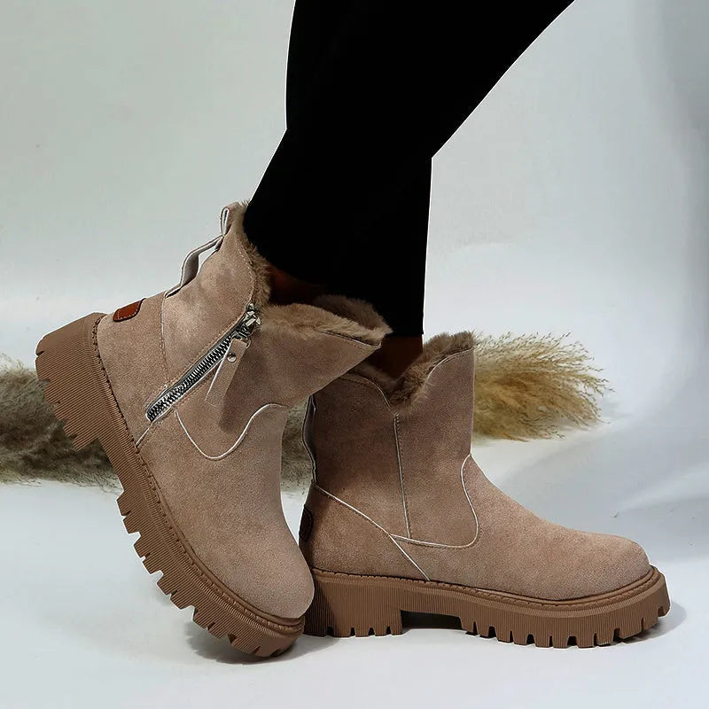 Women's black high-top snow boots with side zipper, plush lining, and non-slip rubber sole