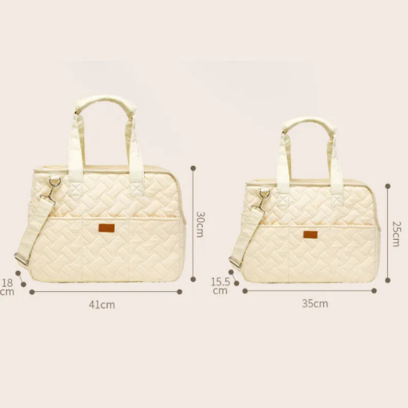 Grey pet carrier handbag with mesh panels and safety cord for cat or small dog transport