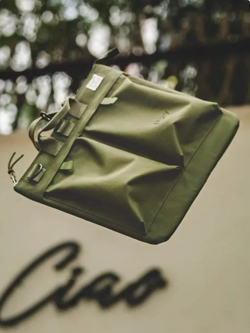 Medium retro canvas crossbody shoulder bag in military green with 15-inch laptop capacity