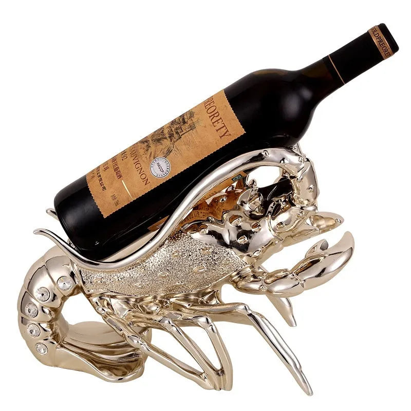 Lobster-shaped wine rack ornament in rose gold or silver metallic finish on tabletop