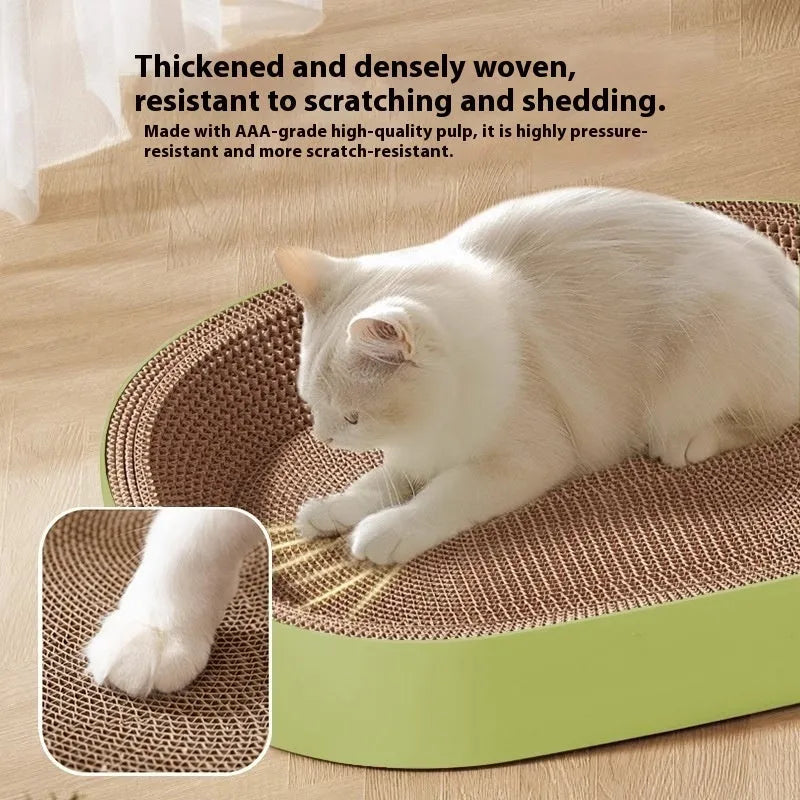 Large green oval corrugated paper cat scratch board serving as a nest for a cat.
