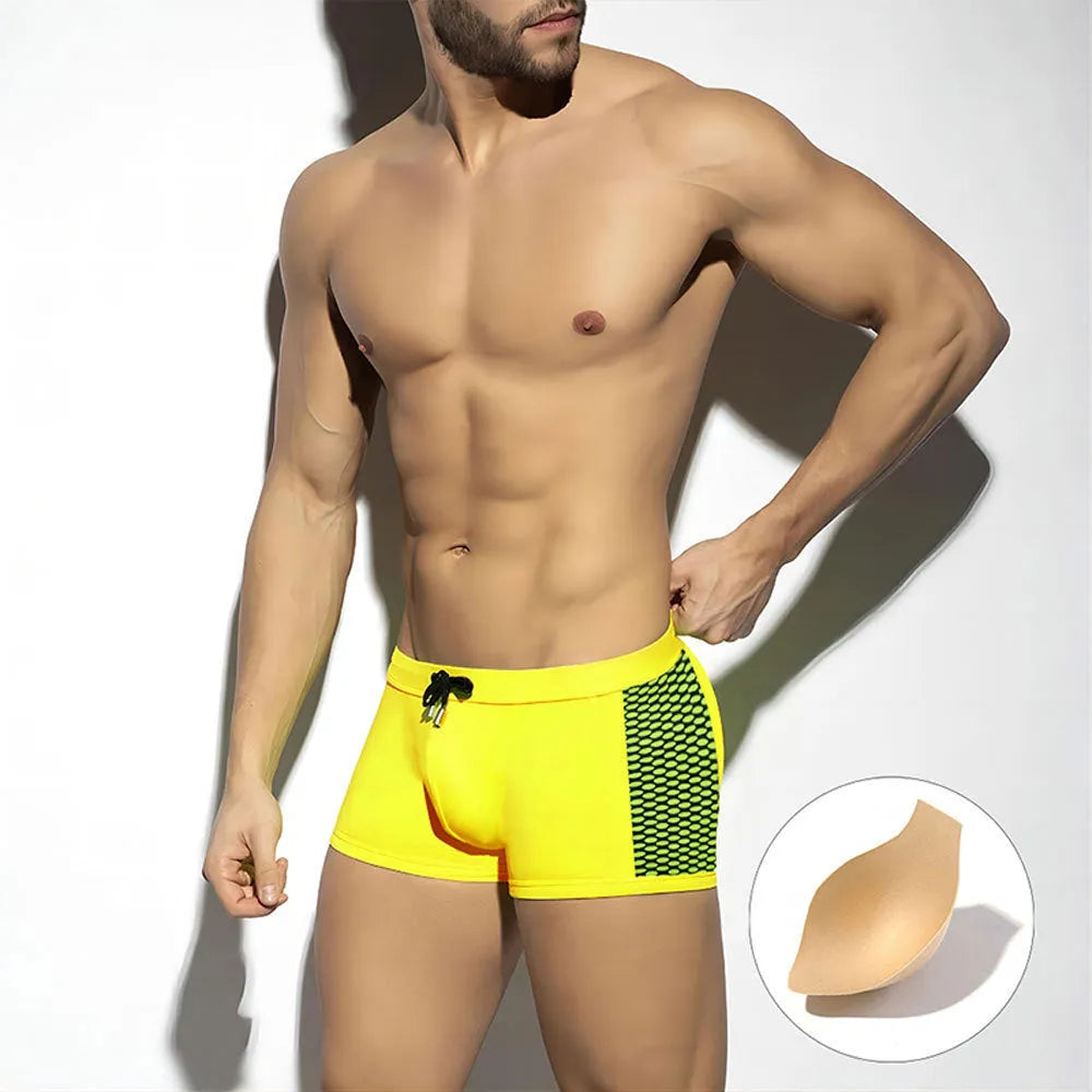 Polka dot print swimming boxers in black, dark blue, or yellow with ribbon or strap cup detailing