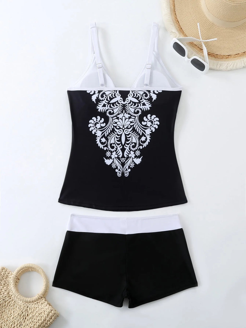 Plus size women's two-piece swimsuit in black or rose red with printed design