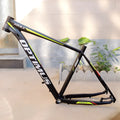 Black green 29-inch aluminium mountain bike frame with internal cable routing and disc brake mounts.