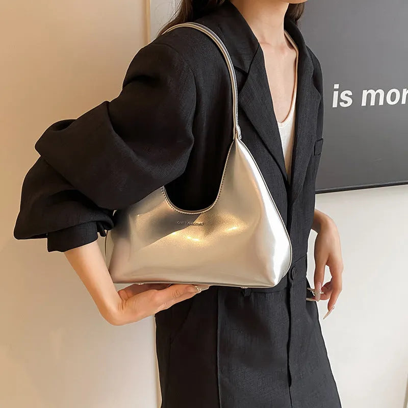 French style PU leather shoulder bag with sewing line detail and dumpling shape, available in multiple colours