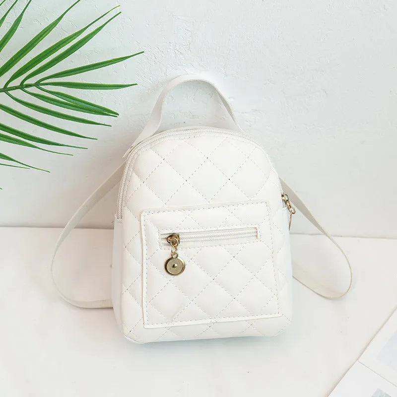 Girls' Korean style embroidered backpack in hard PU measuring 16x7x19cm in black, white or pink