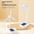 Ivory white solar charging table fan with integrated LED study lamp on desk