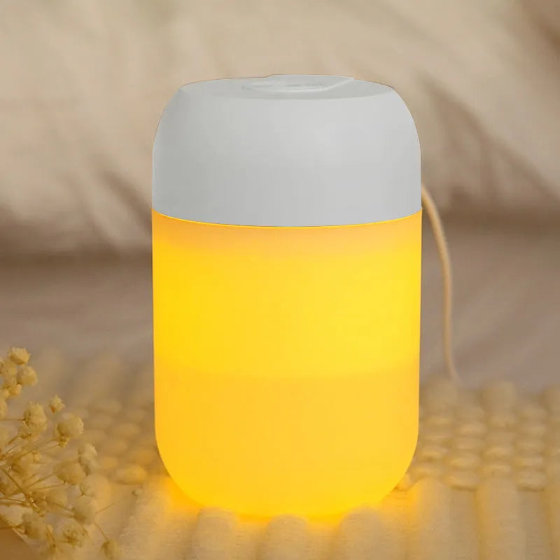 Small white cylindrical USB humidifier with aromatherapy function for desk use