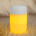 Small white cylindrical USB humidifier with aromatherapy function for desk use
