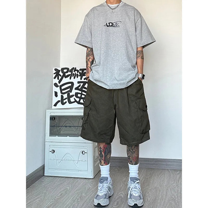 Men's loose straight-leg casual sport shorts in polyester, shown in black, blue, green, and khaki.
