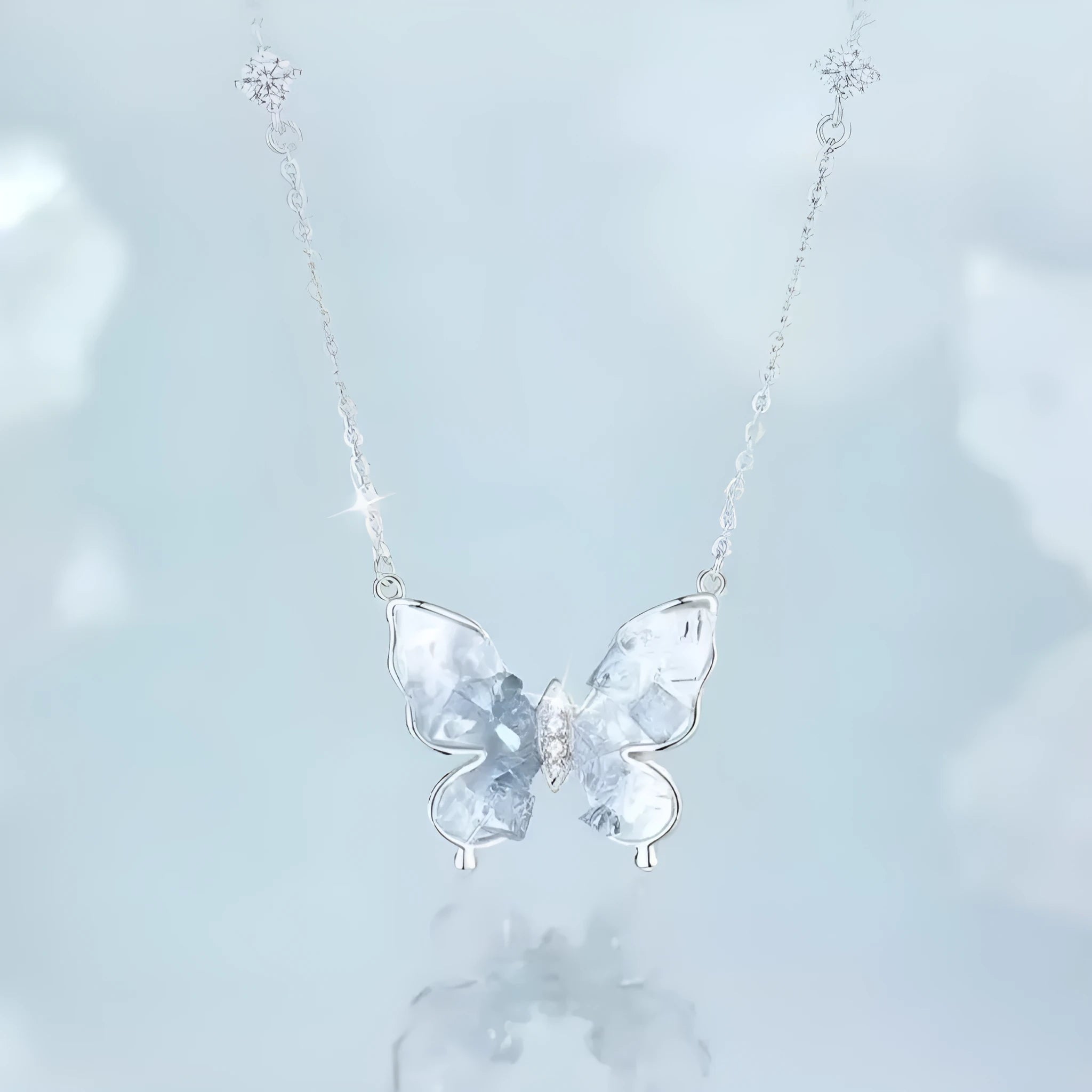 S925 silver necklace with a detailed ice rain style butterfly pendant on an adjustable O-ring chain.