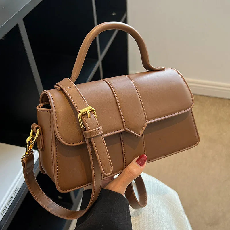 Women's beige PU leather messenger bag with horizontal file organiser and sandwich pocket