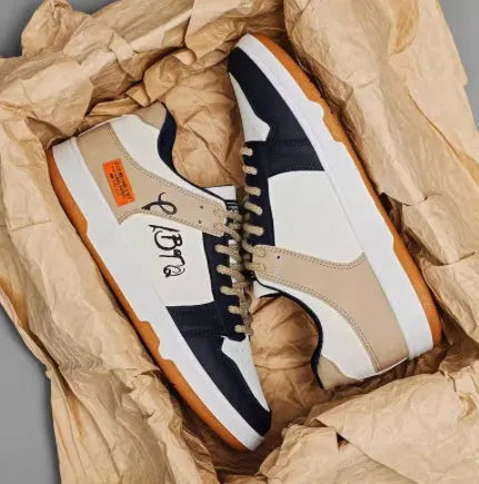 Casual lace-up sneakers in simple plain design for outdoor wear