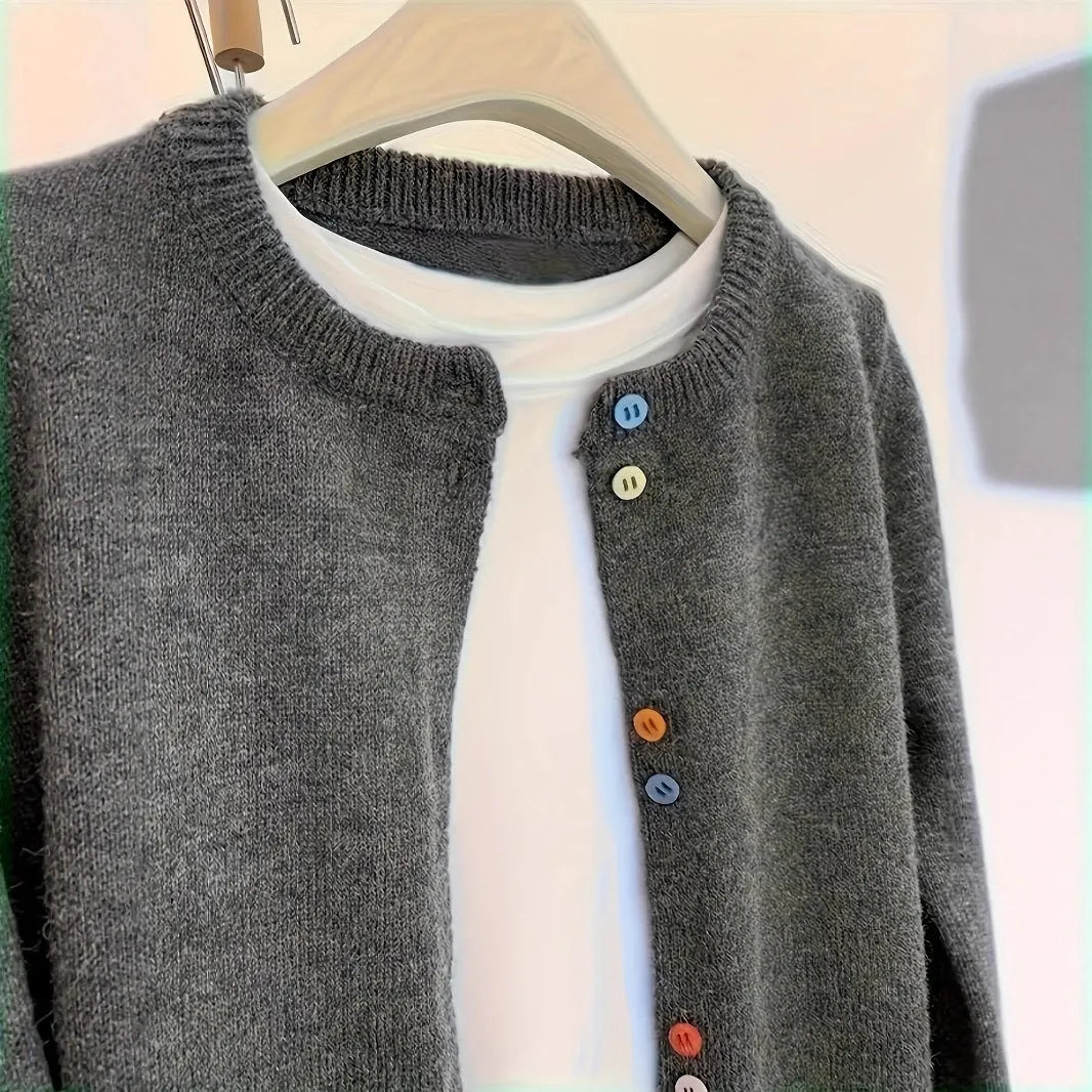 Dark grey women's polyester cardigan with buttons and long sleeves on a hanger