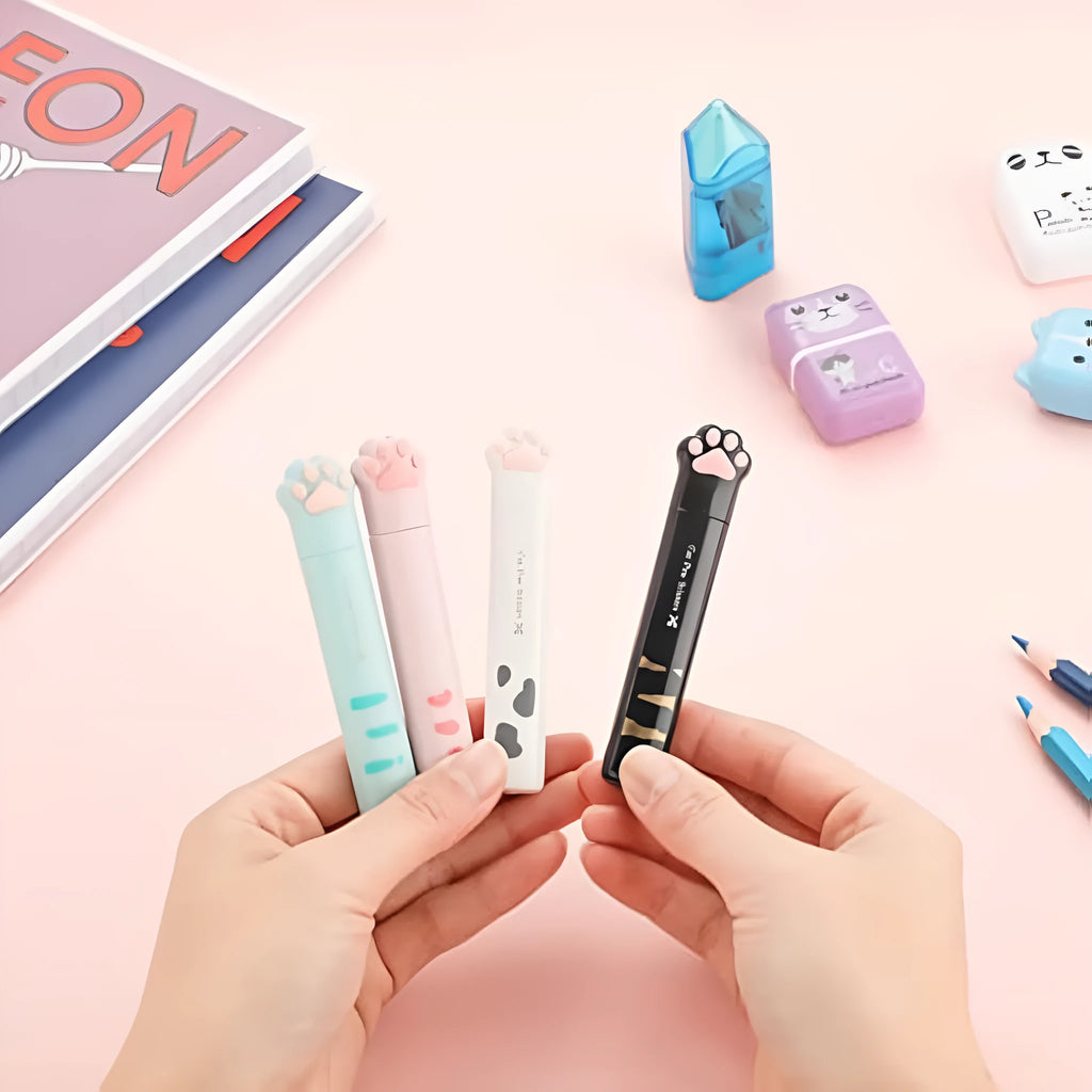 Cat paw mini folding scissors showing stainless steel blades and decorative claw design in four colour options