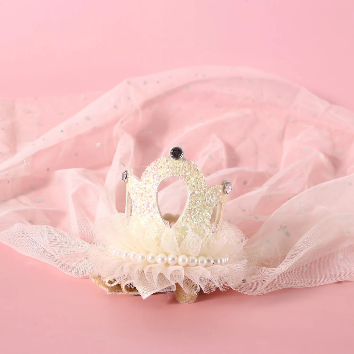 Pet cat wearing princess crown headdress with beige crown veil accessory