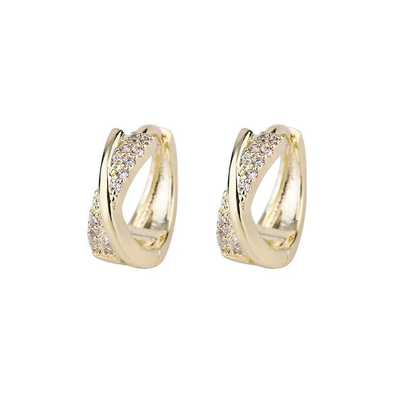 Geometric copper stud earrings with zircon detailing in 14K yellow gold colour