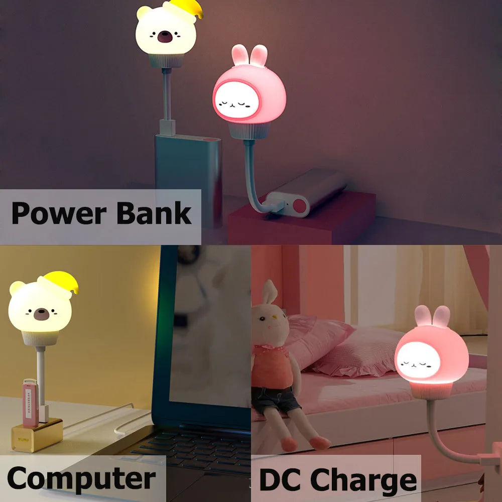 USB portable cartoon animal LED night light with remote control on a bedside table