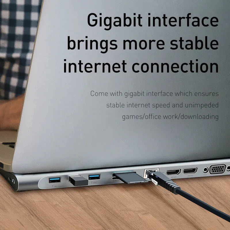 Aluminium ten-port laptop docking station and cooling hub showing HDMI, USB, and Ethernet ports.