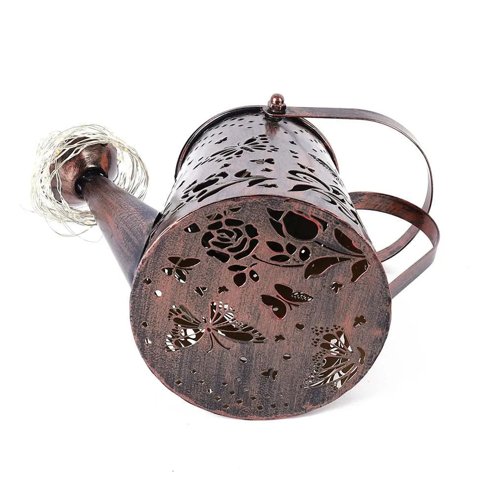 Solar garden lamp with tapered butterfly pattern in iron construction, warm white LED light