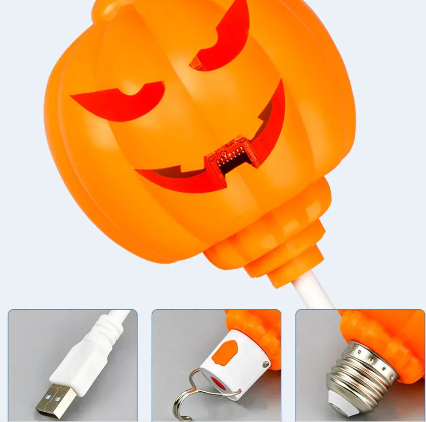 Plastic pumpkin lamp with USB charging port displaying yellow or purple light option