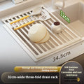 Milky White foldable stainless steel kitchen draining rack shown folded and unfolded.