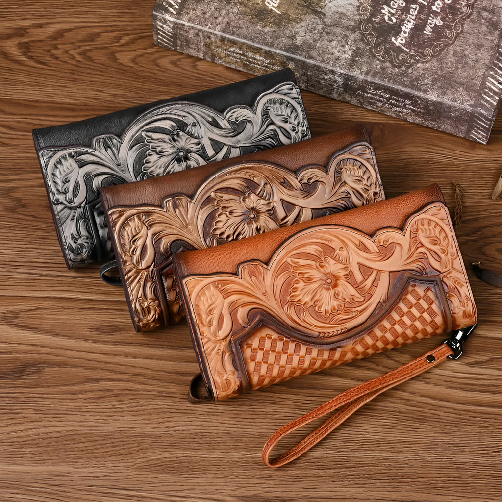 Women's brown leather tri-fold wallet with embossed Chinese floral pattern showing interior compartments