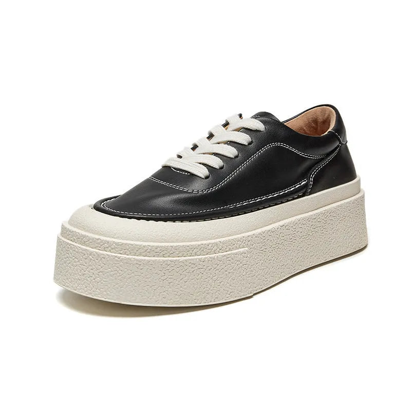 Women's black platform sports shoes with embossed cowhide upper and rubber sole