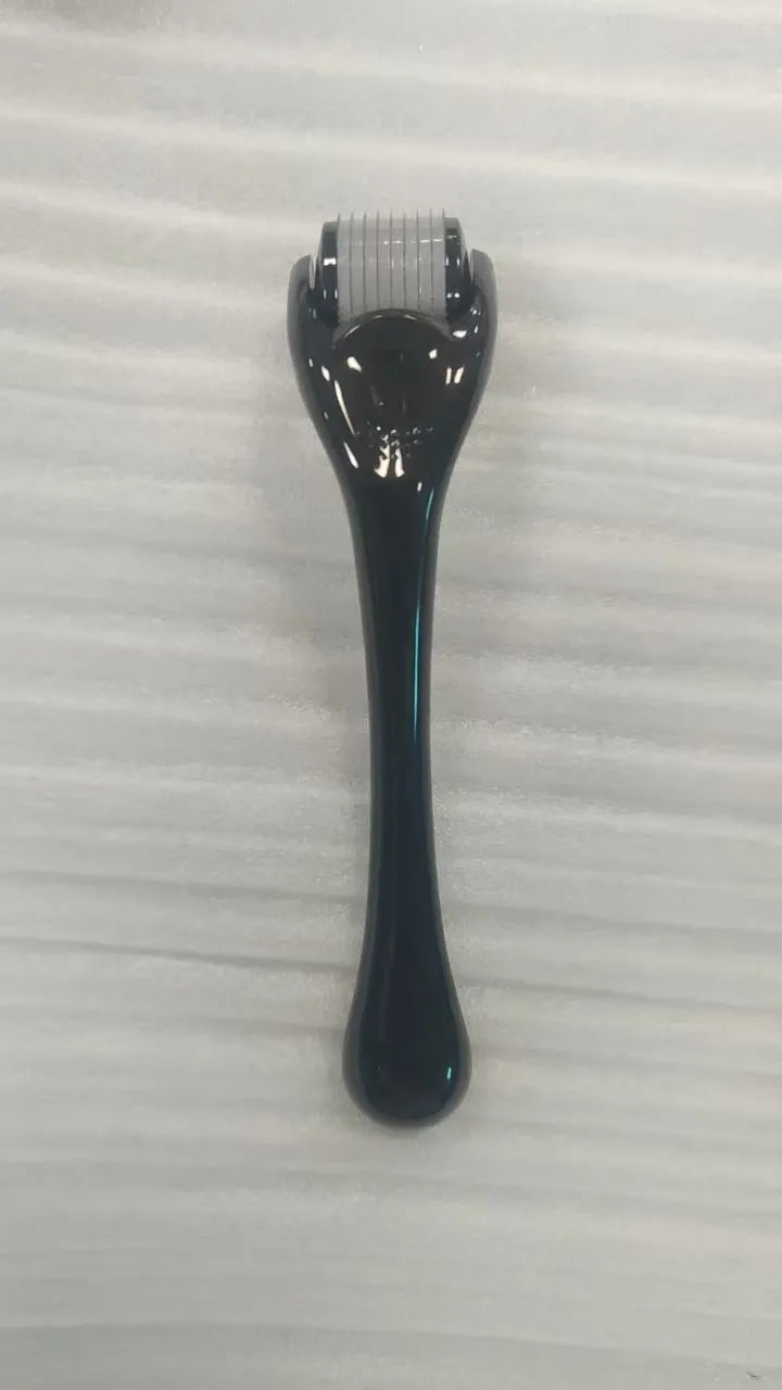 Black handle microneedle roller with purple wheel showing 540 needles, next to white and blue handle options.
