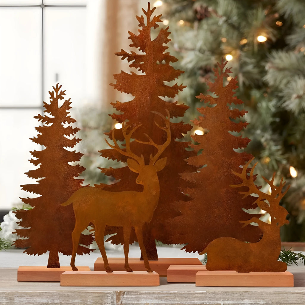 Three iron Christmas tree ornaments with elk designs in rustic finish