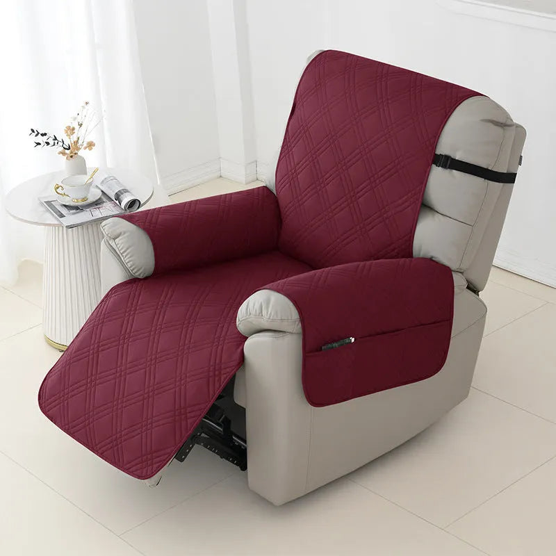 Quilted burgundy sofa cover stretched over a single Chivas massage chair cushion.