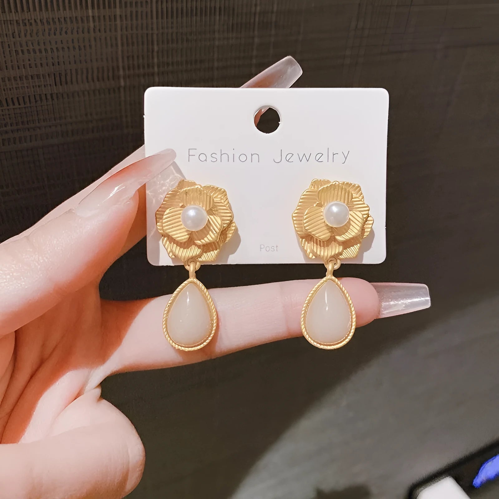 Gold colour flower stud earrings with needle rose pearl design and opal stone
