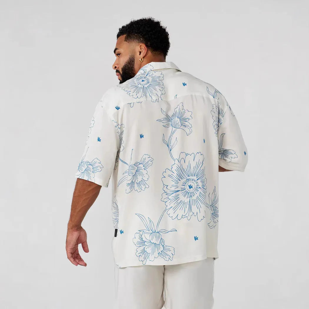 Men's loose fit short sleeve top with flower pattern printing in neutral colour options