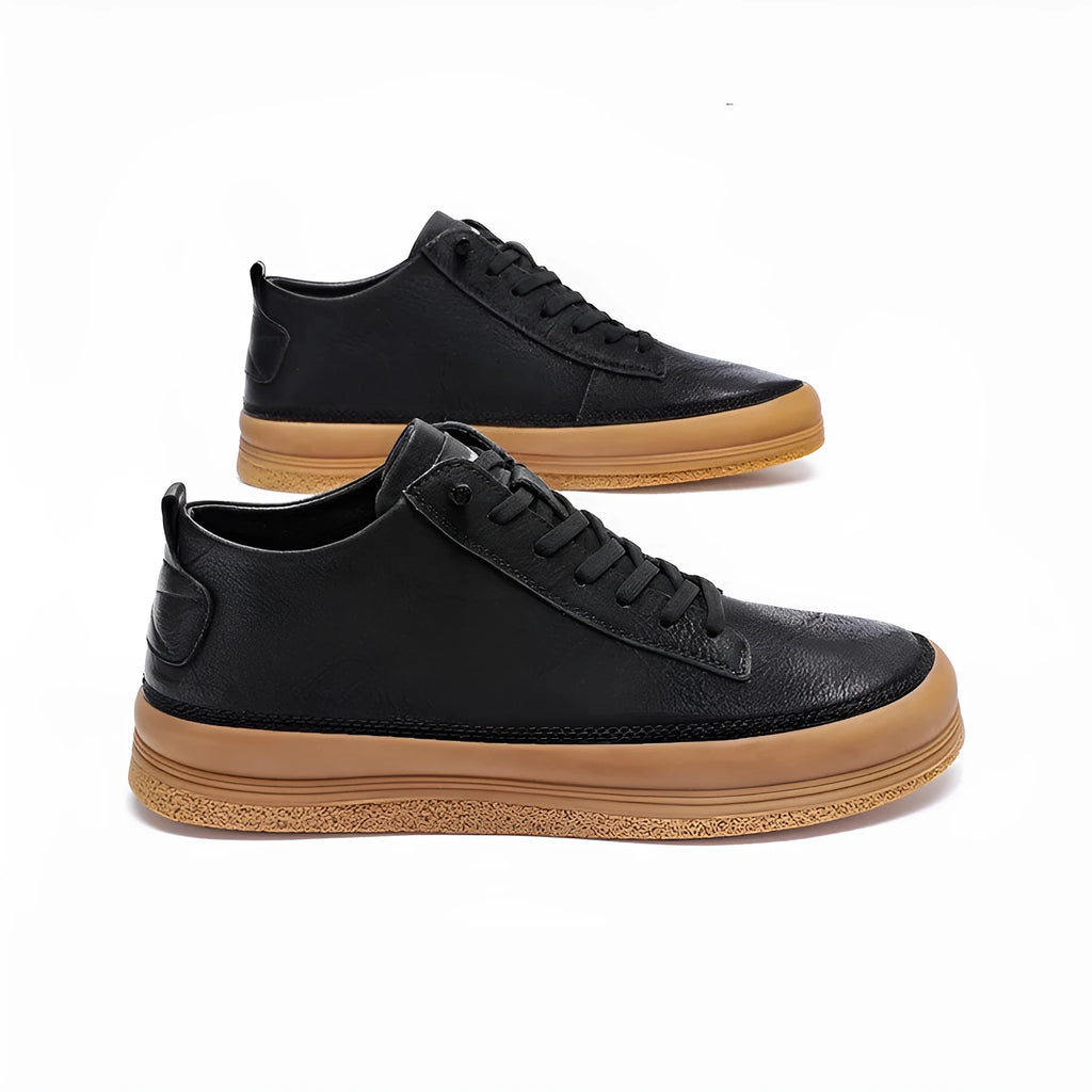 Men's black casual leather shoes with round toe, flat heel, and lace closure on a white background