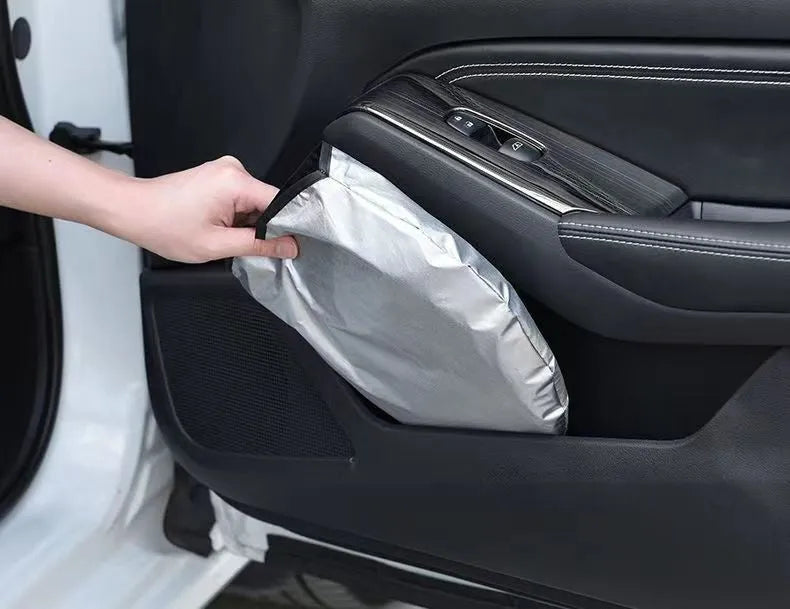 Titanium silver aluminium foil car sunshade unfolded, showing reflective surface.