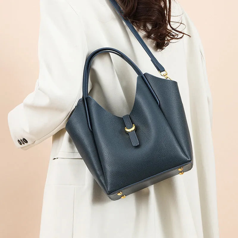 Genuine leather women's hand holding bucket bag in retro style with file bag interior