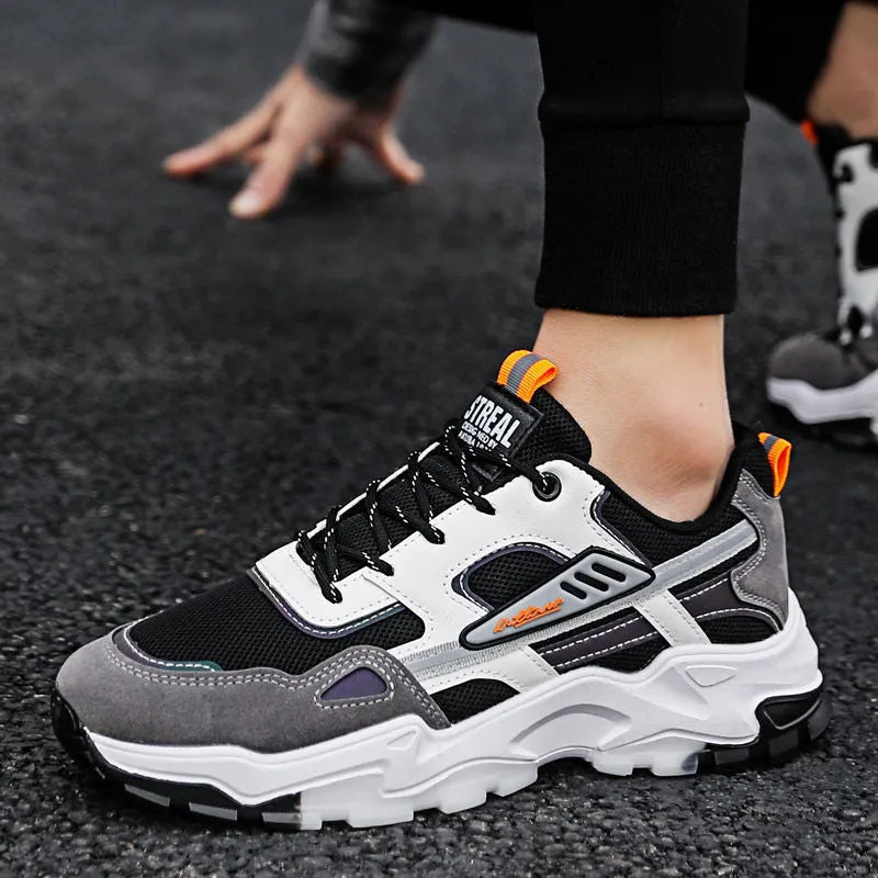 Black and white men's lace-up mesh sneakers with thick rubber sole for outdoor running