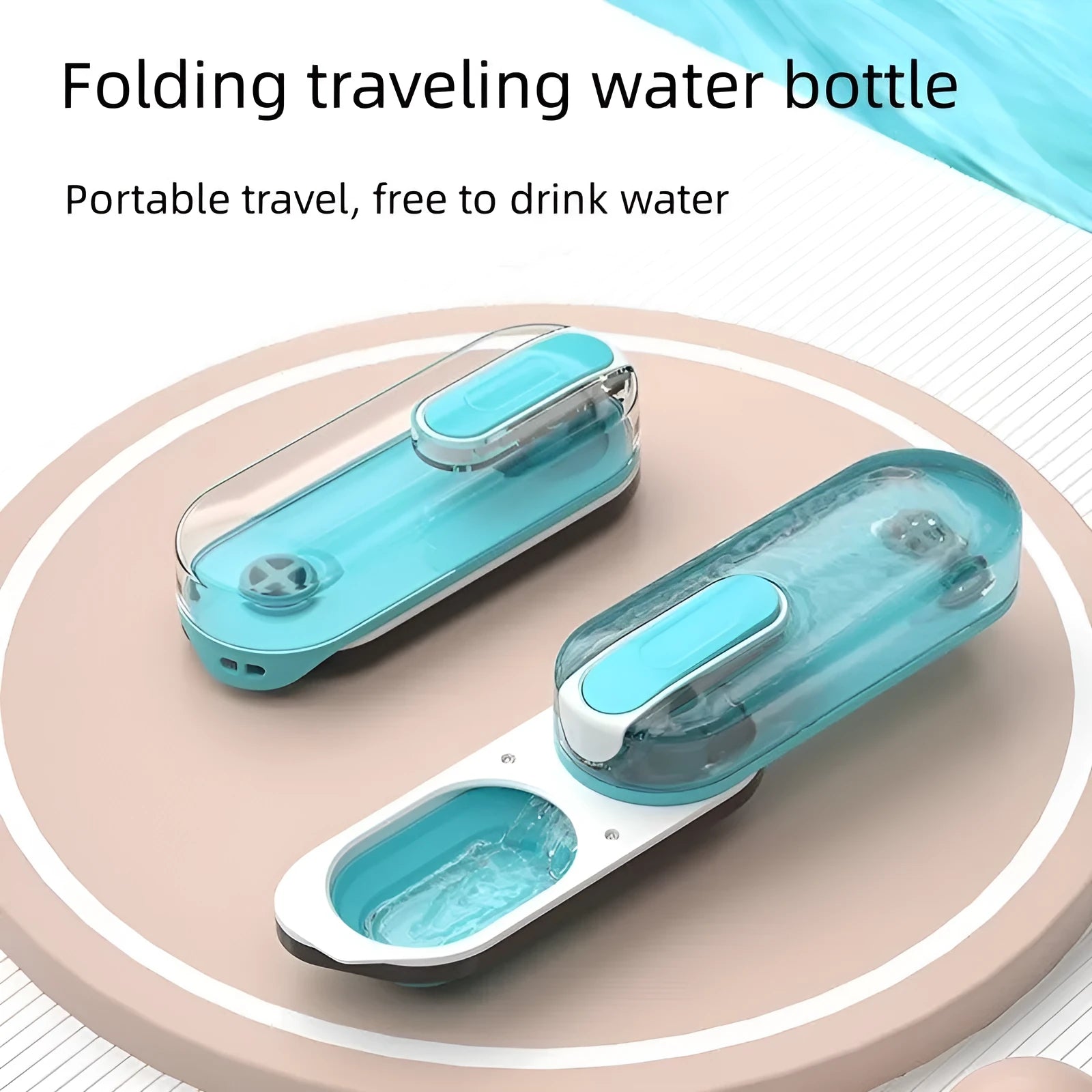 Blue portable dog water bottle with a folded pink silicone drinking bowl attached to its side.