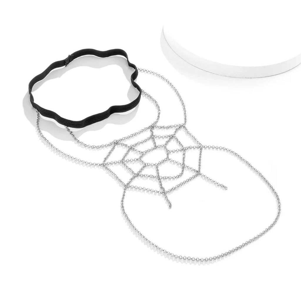 Women's simple geometric body chain in silver electroplated alloy, shown as an anklet