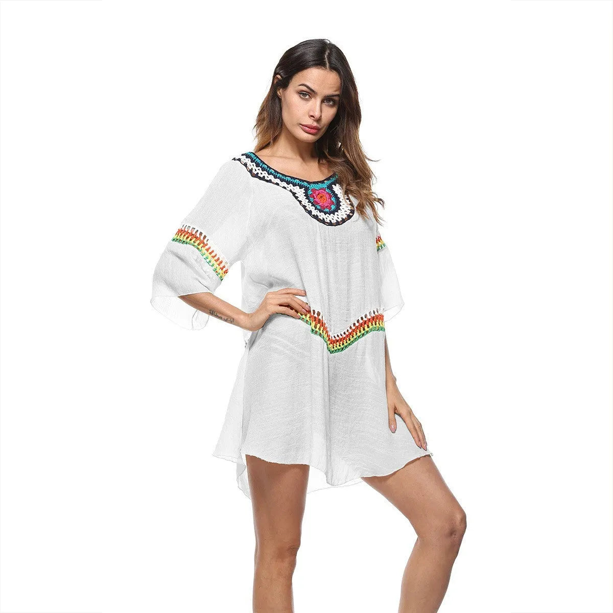 Women's crocheted polyester beach cover-up in apricot colour, shown as a sun protection top for swimming.
