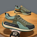 Men's grey mesh running shoes with round toe and lace-up closure on sports surface
