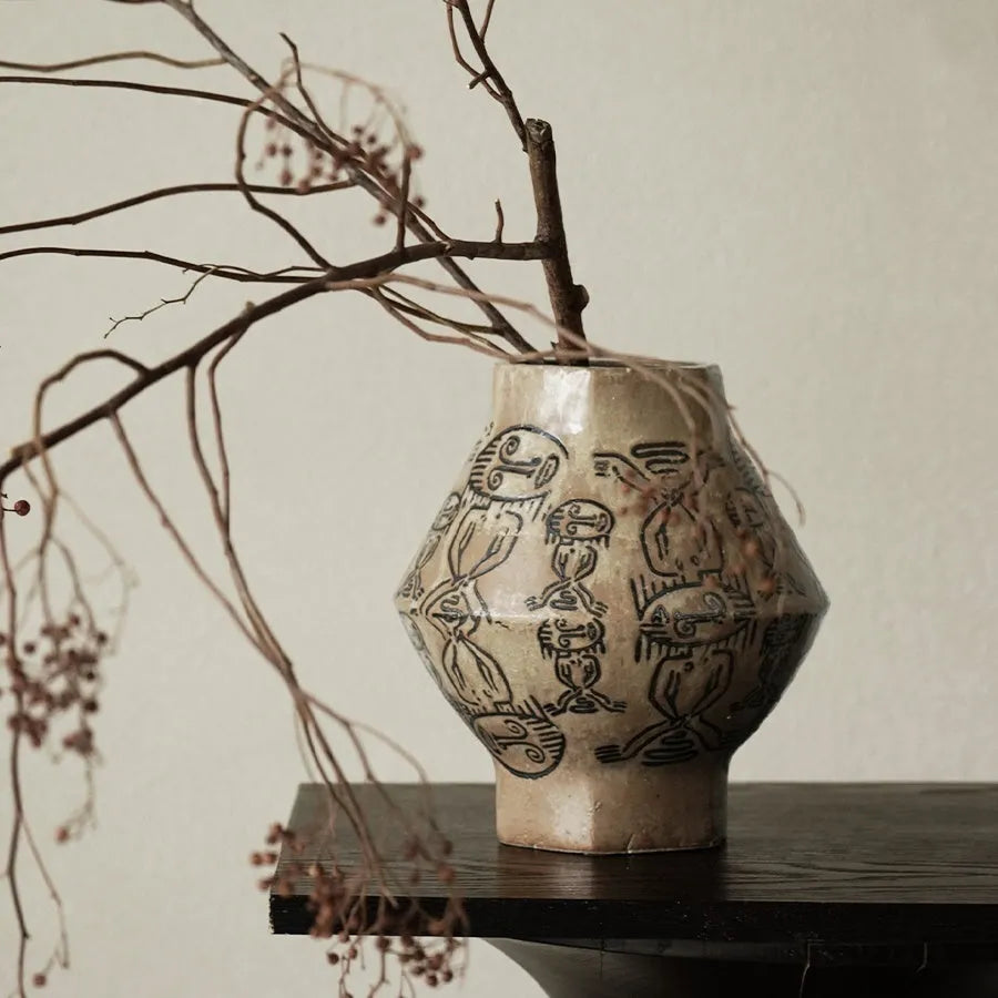 Hand-painted ceramic cylindrical vase with vintage carved art design in tribal totem flower colours