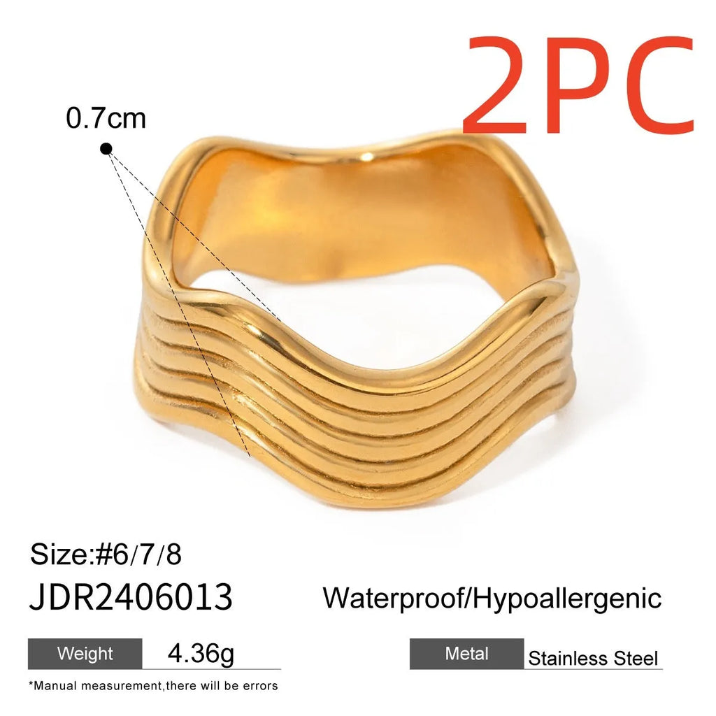 Stainless steel geometric wave ring with wide surface design