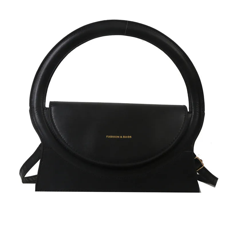 PU messenger bag in a horizontal square shape with a sandwich pocket and stitching detail.
