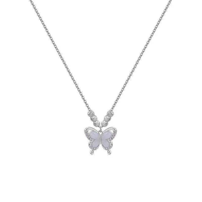 925 sterling silver opal butterfly pendant necklace on a silver adjustable cross chain.