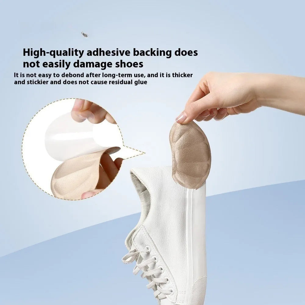 Three pairs of camel-coloured anti-blister heel cushion stickers with suede surface