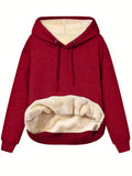 Women's loose fit hooded sweater with front pockets in thick polyester fleece