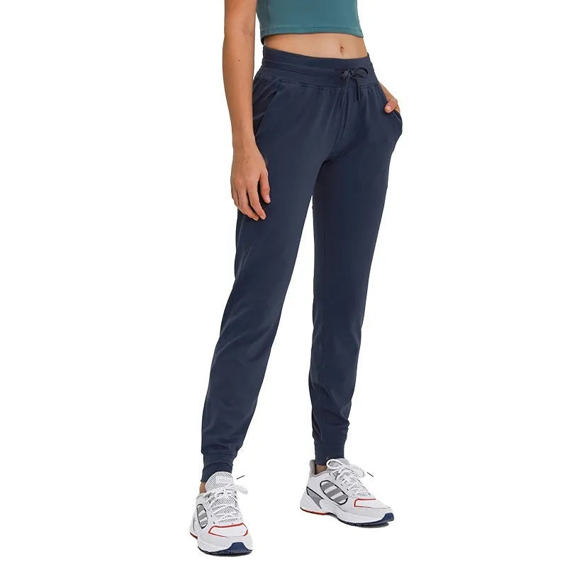 Women's high waist yoga pants in Belgian Blue colour with drawstring waistband for running fitness